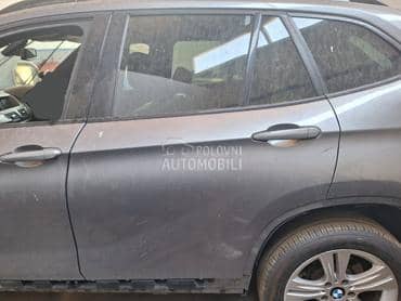 Vrata zadnja leva siva E84 za BMW X1 od 2009. do 2015. god.