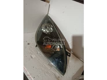 Crni far za Mitsubishi Colt od 2004. do 2008. god.