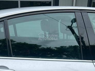 Staklo zadnje desno hečbek za Renault Laguna od 2007. do 2015. god.