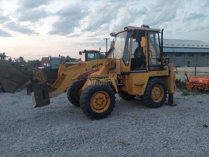 Komatsu WB98A TOP PONUDA