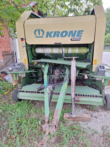 Krone Round pack rolo presa