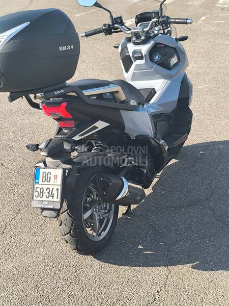 Sym ADX 125  nov  sa koferom
