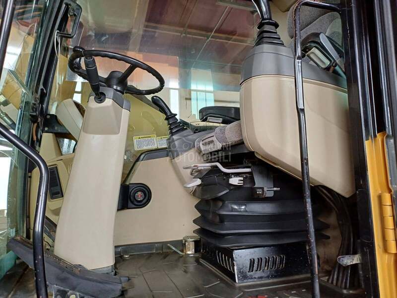 CAT M313C