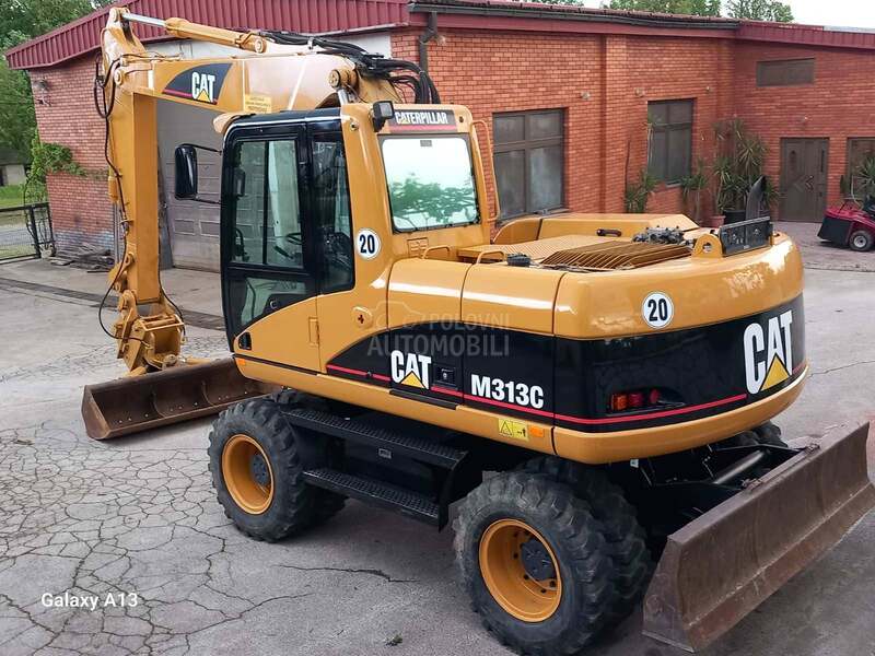 CAT M313C