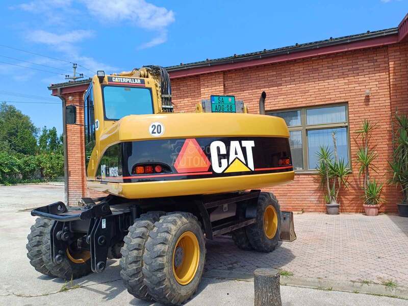 CAT M313C