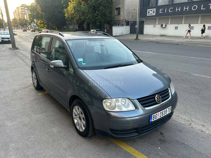 Volkswagen Touran 2.0 tdi 7 sed