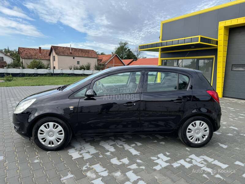 Opel Corsa D 1.2 tng bas dobra