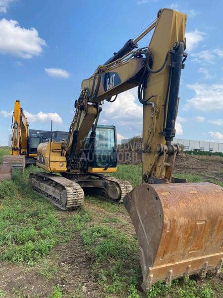 CAT 323D