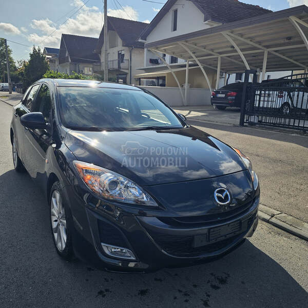 Mazda 3 T O P