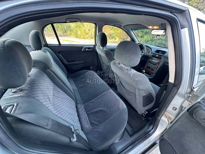 Opel Astra G 1.8i pliin