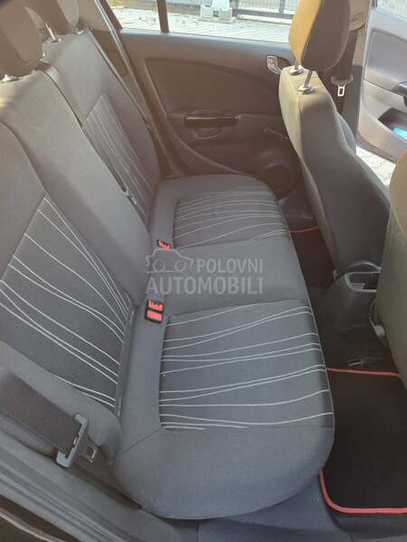Opel Corsa D 1.4 ENJOY CH