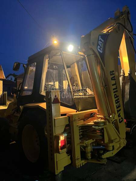 CAT 428b