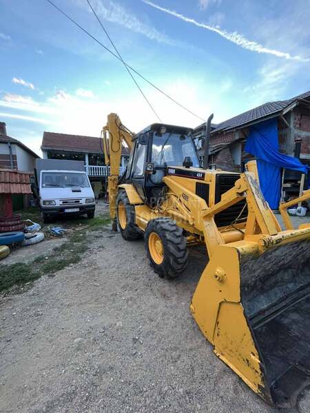 CAT 428b
