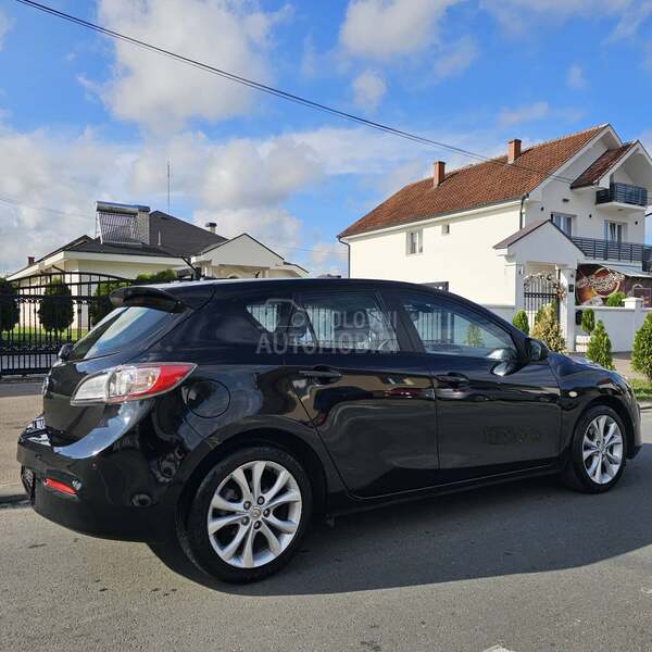 Mazda 3 T O P