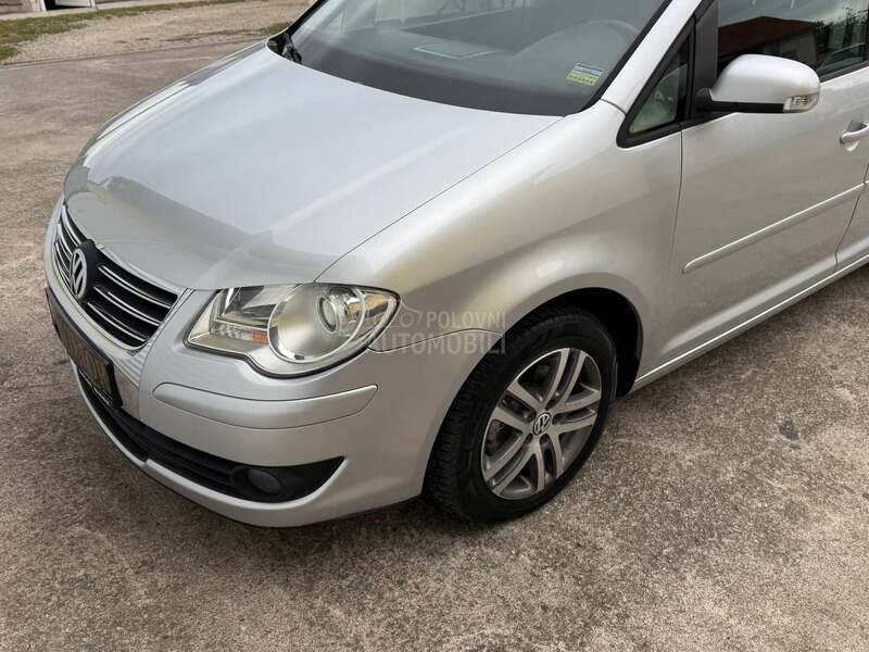Volkswagen Touran R E Z E R V I S A N