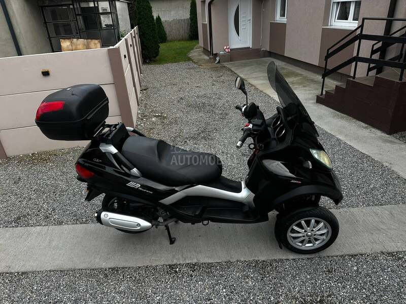 Piaggio mp3 touring 300ie B kat