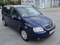 Volkswagen Touran 2,0TDI DSG HIGH LINE