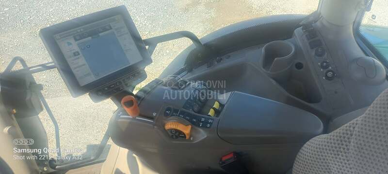 John Deere R6215