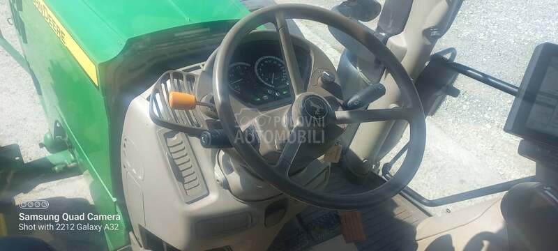 John Deere R6215