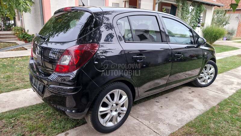 Opel Corsa D 1.4/ENJOY/CH