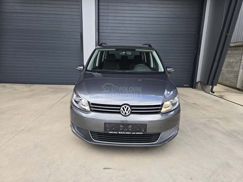 Volkswagen Touran 1.6 TDI 7 SEDISTA
