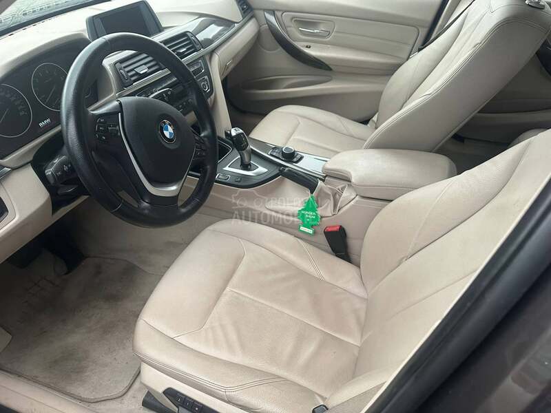 BMW 328 i X Drive CH