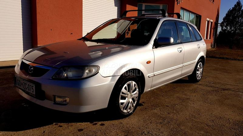 Mazda 323 1.6 2002. god. -  kompletan auto u delovima