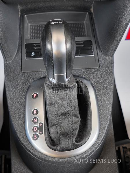 Volkswagen Touran 1.6 TDI DSG 7 sed