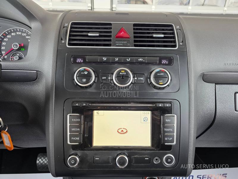 Volkswagen Touran 1.6 TDI DSG 7 sed