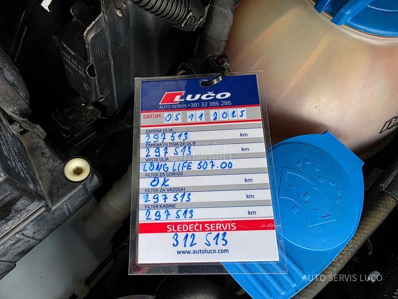 Volkswagen Touran 1.6 TDI DSG 7 sed