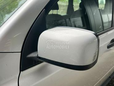 Retrovizor levi sivi za Nissan X-Trail od 2007. do 2013. god.