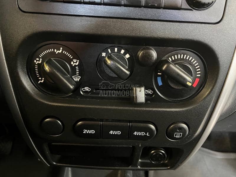 Suzuki Jimny 1.3 4x4 ODLIČAN CH