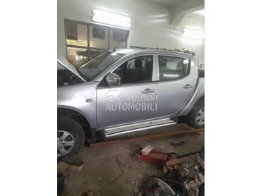 delovi karoserije i motora za Mitsubishi L200 za 2011. god.