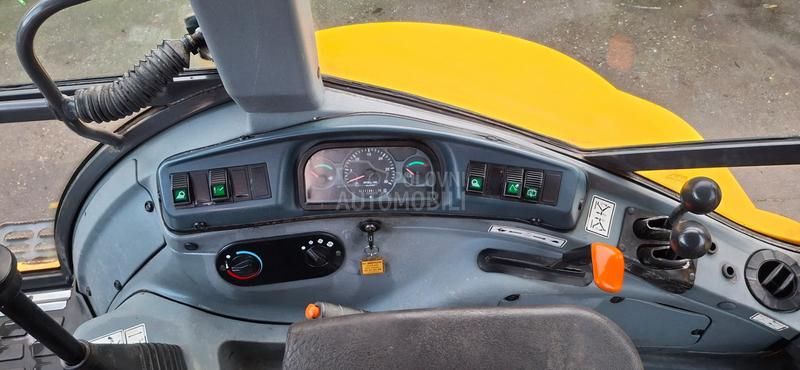 New Holland LB 110 B