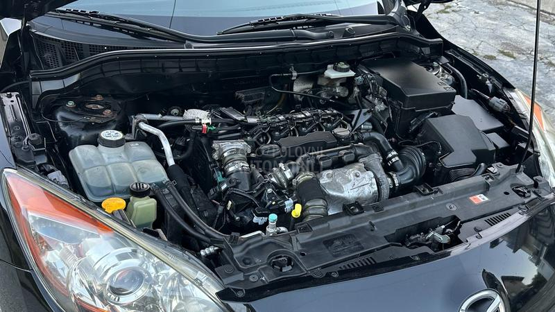 Mazda 3 1.6 D.IZUZEETNA