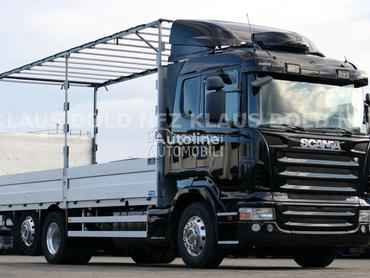 Scania R580 6x2 platformom,rampa