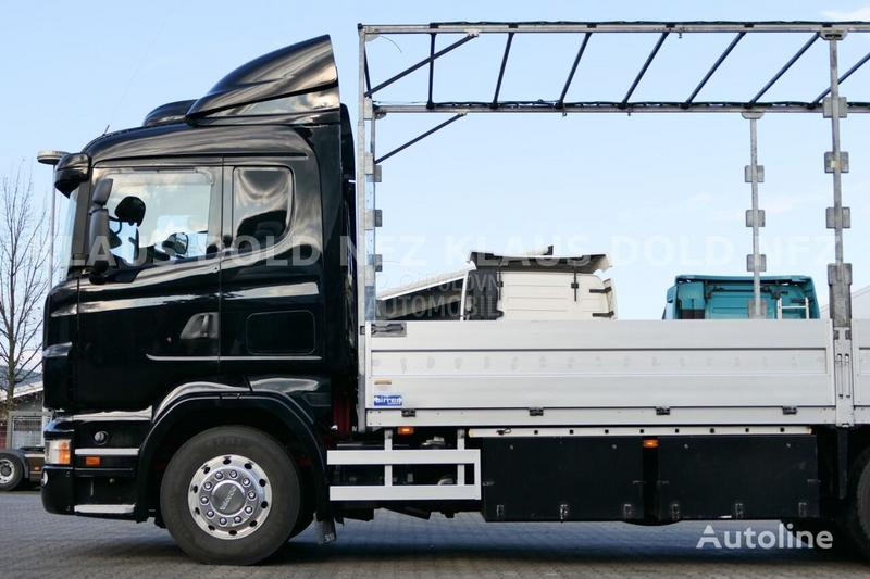Scania R580 6x2 platformom,rampa