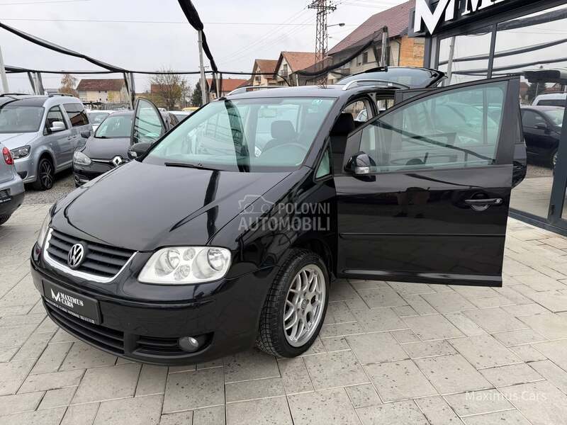 Volkswagen Touran 2.0 TDI 7 SEDISTA