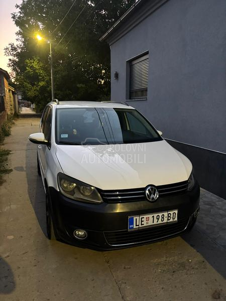Volkswagen Touran kask o akcij