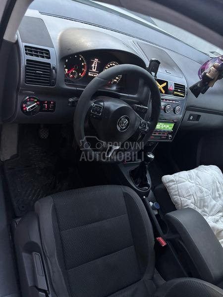 Volkswagen Touran kask o akcij