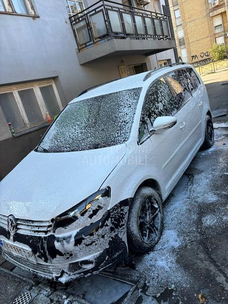 Volkswagen Touran kask o akcij