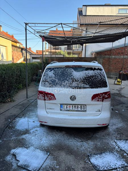 Volkswagen Touran kask o akcij