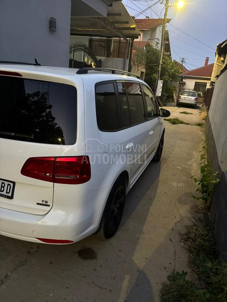 Volkswagen Touran kask o akcij