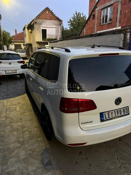 Volkswagen Touran kask o akcij