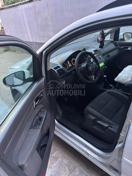 Volkswagen Touran kask o akcij