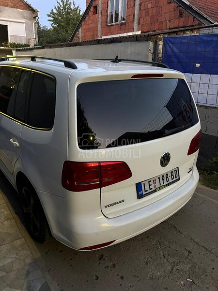 Volkswagen Touran kask o akcij