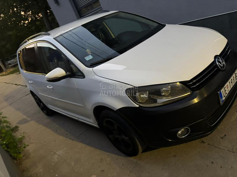 Volkswagen Touran kask o akcij