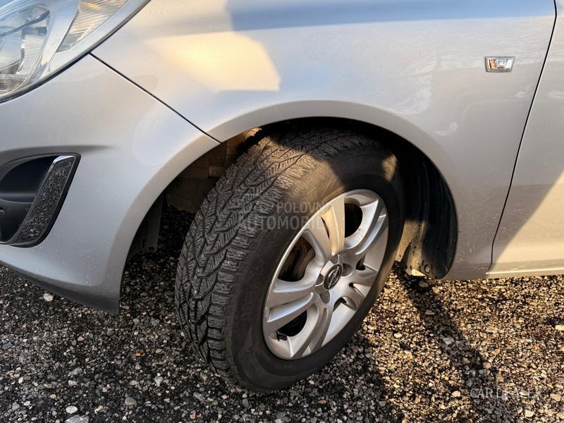 Opel Corsa D 1.3d/cosmo/ristajl