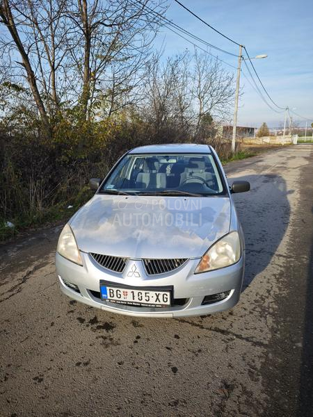Mitsubishi Lancer Salon 1.3 SD MPI COM