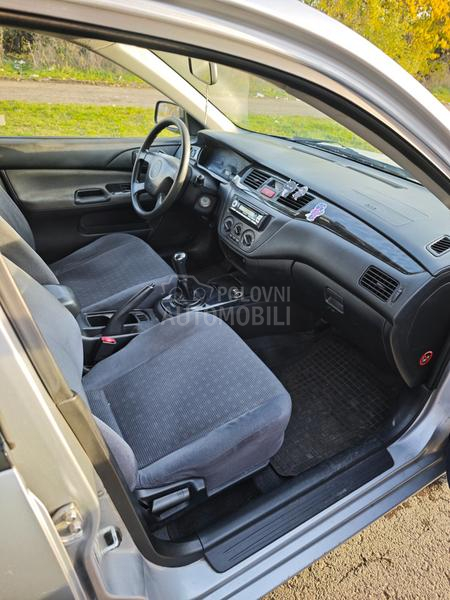Mitsubishi Lancer Salon 1.3 SD MPI COM